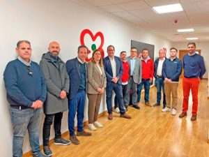 Compañeros de New Holland y Primaflor durante su visita